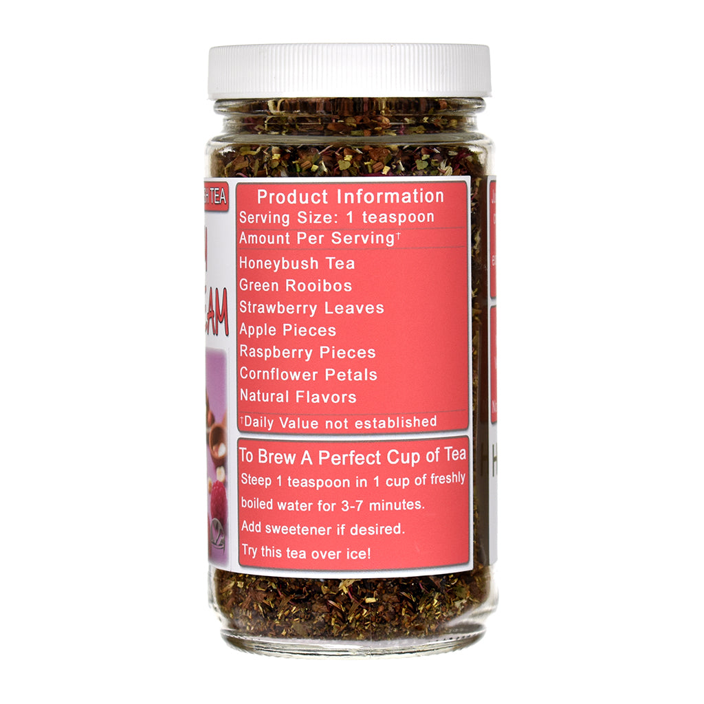Jar of Raspberry Hazelnut Cream Honeybush tea with a red label on a white background