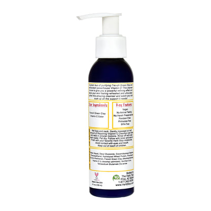 Bottle of Repairing Vitamin C Cleanser with pump and label on a white background