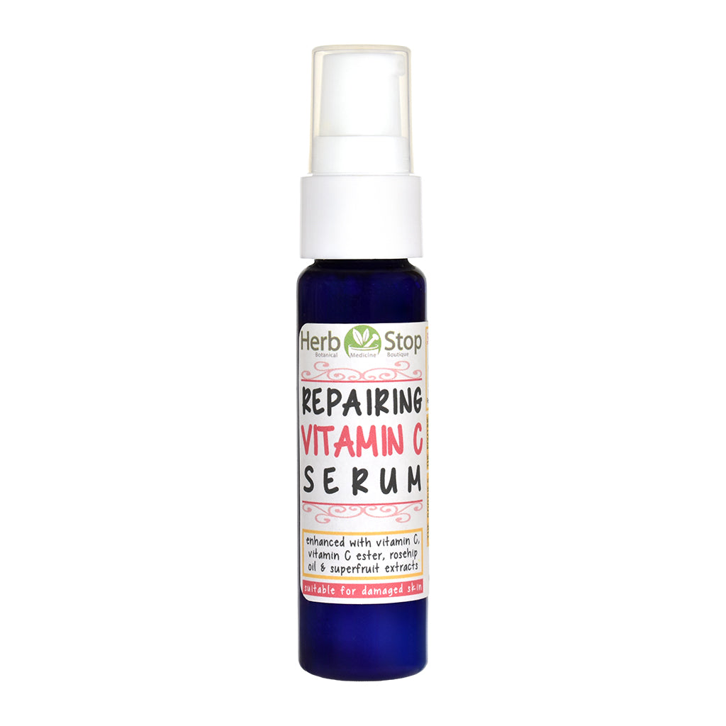 Bottle of Herb Stop Repairing Vitamin C Serum on a white background