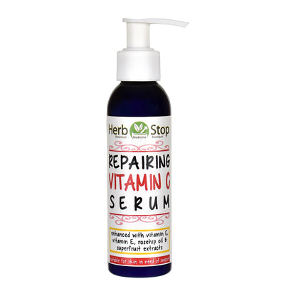 Bottle of Herb Stop Repairing Vitamin C Serum on a white background