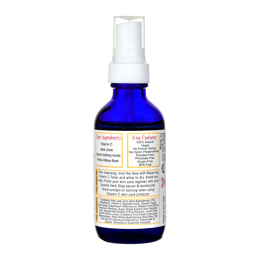 Repairing Vitamin C Toner bottle with white spray nozzle on a white background