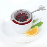 Teapot mesh tea strainer with hibiscus tea and lemon