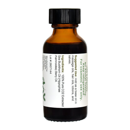 An amber glass bottle of CO2 Sea Buckthorn Oil with a black ribbed cap and a white label, shown on a plain white background.