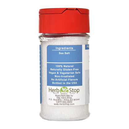 Herb Stop sea salt container with red lid on a white background