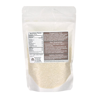 Organic Sesame Seeds in a bag on a white surface