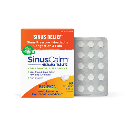 Boiron SinusCalm 60 Meltaway Tablets with a blister pack of homeopathic remedy next to an orange and white box.