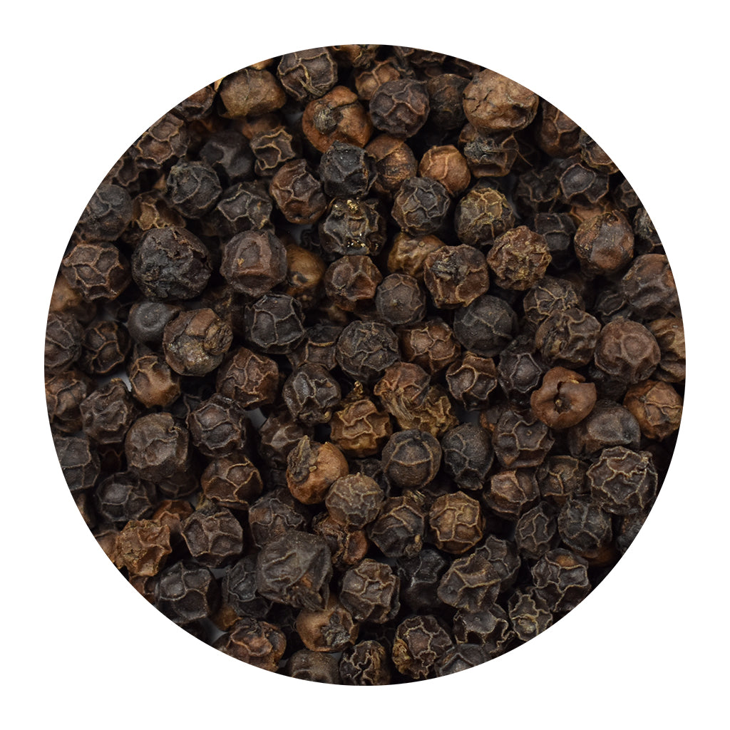 A circular close-up of whole smoked black peppercorns, shown on a plain white background.