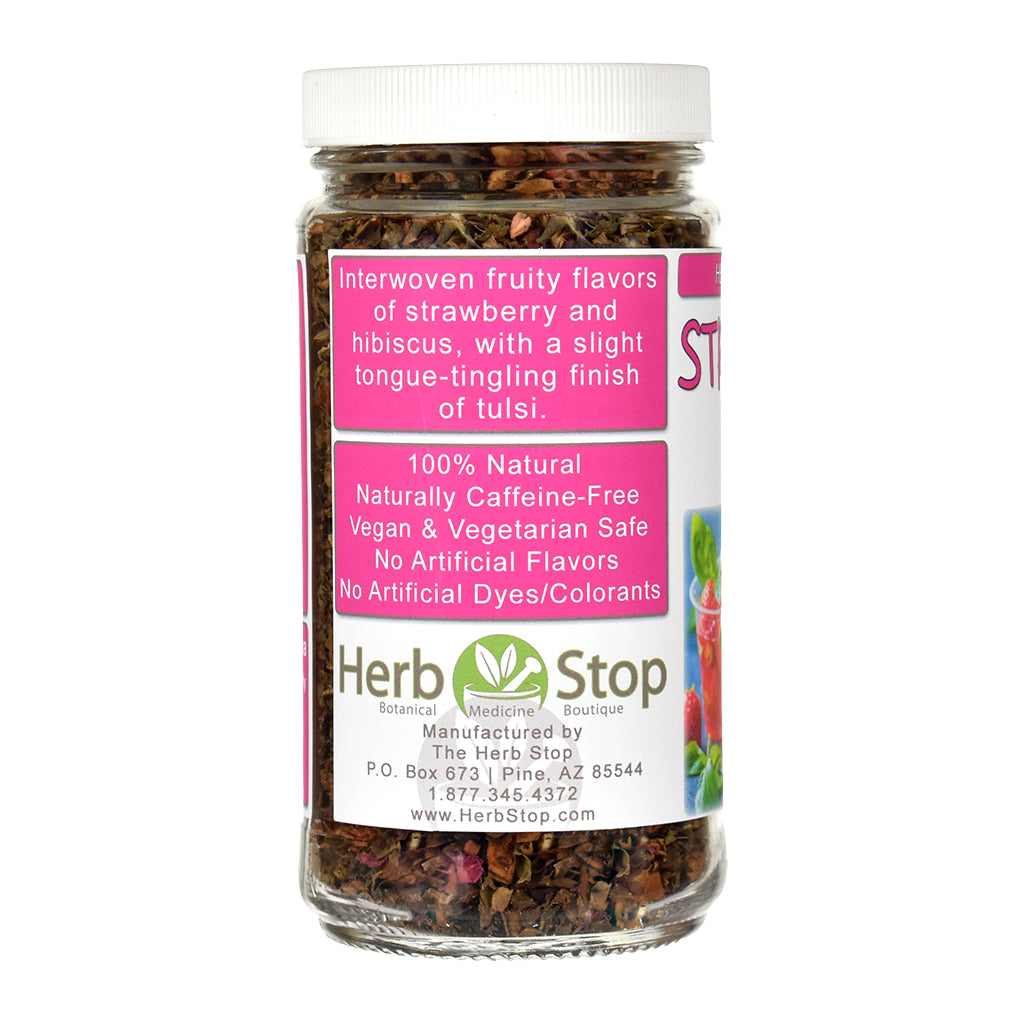 Jar of Strawberry Tulsi Herb & Fruit Tea with a pink label on a white background