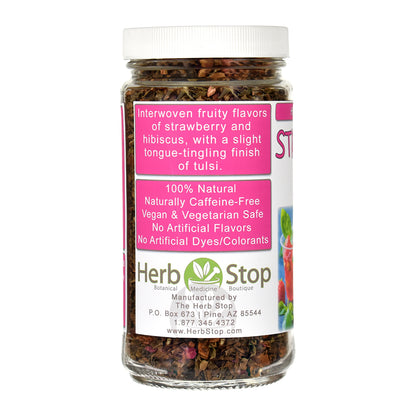 Jar of Strawberry Tulsi Herb & Fruit Tea with a pink label on a white background