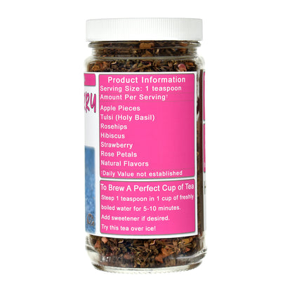 Jar of Strawberry Tulsi Herb & Fruit tea with a pink label on a white background