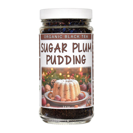Jar of organic black tea labeled 'Sugar Plum Pudding' with a festive background on the label.