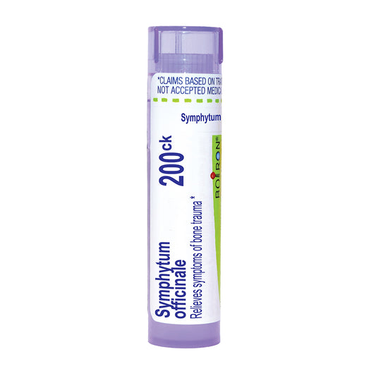 A single tube of Boiron Symphytum Officinale 200ck homeopathic remedy, featuring a white label with purple and green accents, on a solid white background.