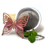 Tea ball with butterfly weight
