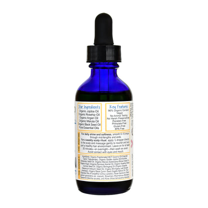 Bottle of Herb Stop's The Mane Obsession Hair Oil on a white background