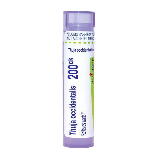 A single tube of Boiron Thuja occidentalis 200ck wart relief homeopathic remedy, featuring a white and light purple design with blue and green text, on a solid white background.