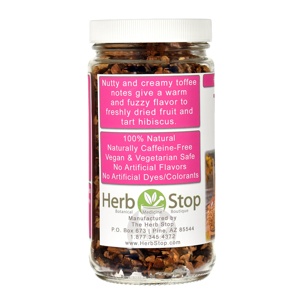Jar of Toffee Apple Herb & Fruit Tea with a pink label on a white background