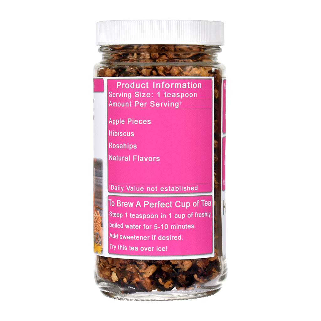 Jar of Toffee Apple Herb & Fruit tea with a pink label on a white background