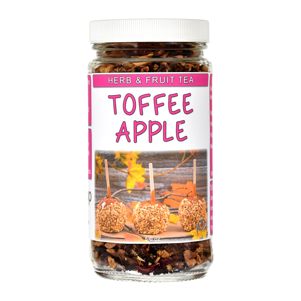 Jar of 'Toffee Apple' herb and fruit tea with a colorful label on a white background