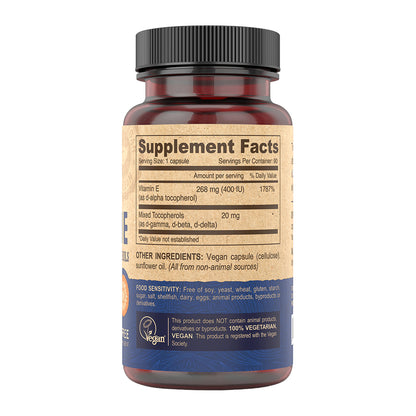 Vitamin E Oil supplement bottle with label showing 'Supplement Facts' on a white background