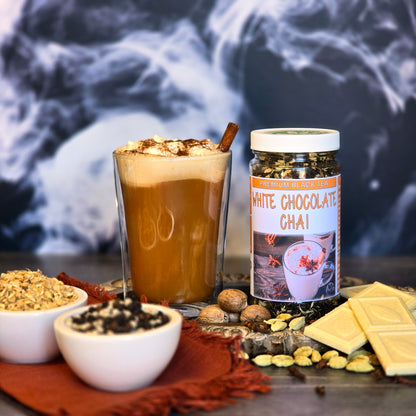 White Chocolate Chai with tea mug and herbs