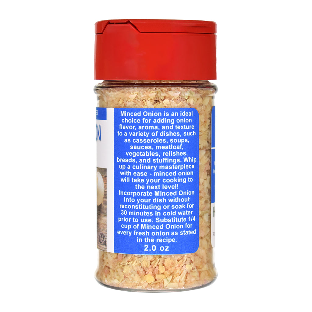 Jar of minced white onion with a red lid on a white background