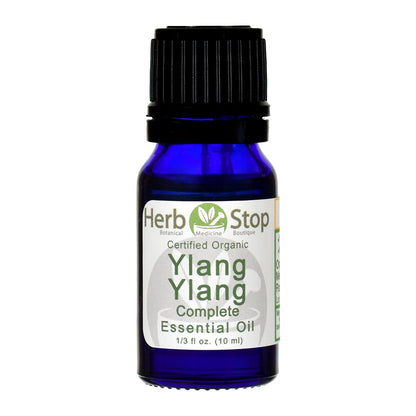 Bottle of Herb Stop Ylang Ylang Complete essential oil on a white background