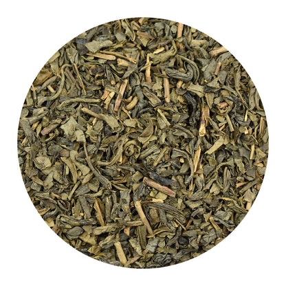 A circular close-up of Young Hyson loose-leaf green tea leaves, showing dried green leaves and light brown stems, set against a plain white background.