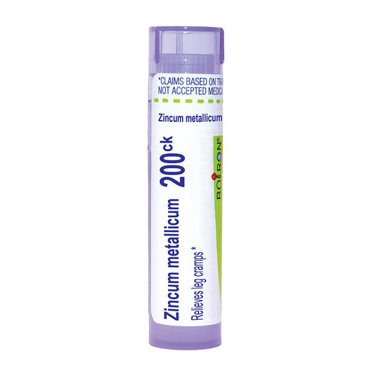 A single tube of Boiron Zincum metallicum 200ck homeopathic remedy, featuring a white label with blue and green text and accents, capped in a translucent light purple plastic, on a solid white background.