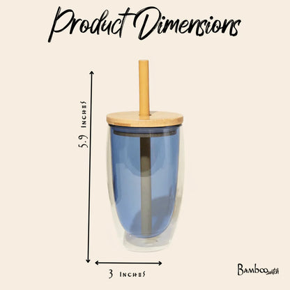 Blue glass tumbler with a bamboo straw lid and dimensions on a beige background