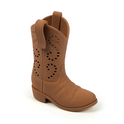 A single tan western-style tea infuser boot with decorative cutout patterns on the shaft, on a clean white background.
