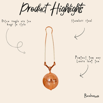 Stainless steel tea ball with text highlighting features on a beige background